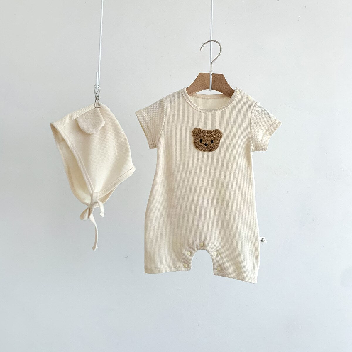 cream romper with hat