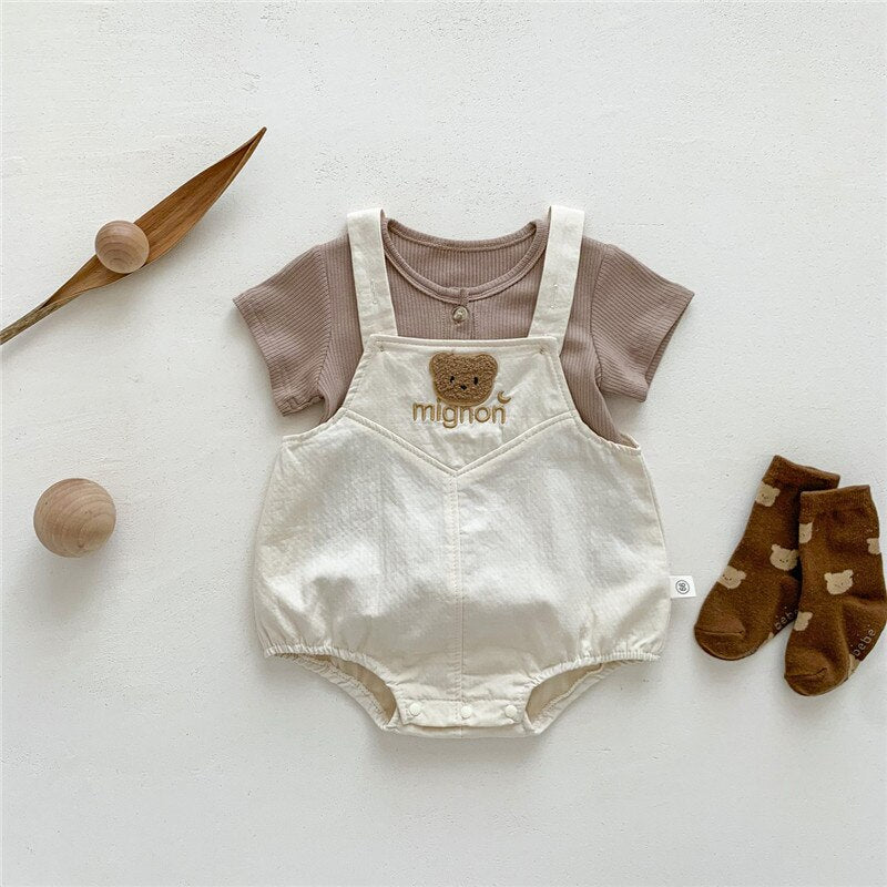 cream romper with brown t shirt