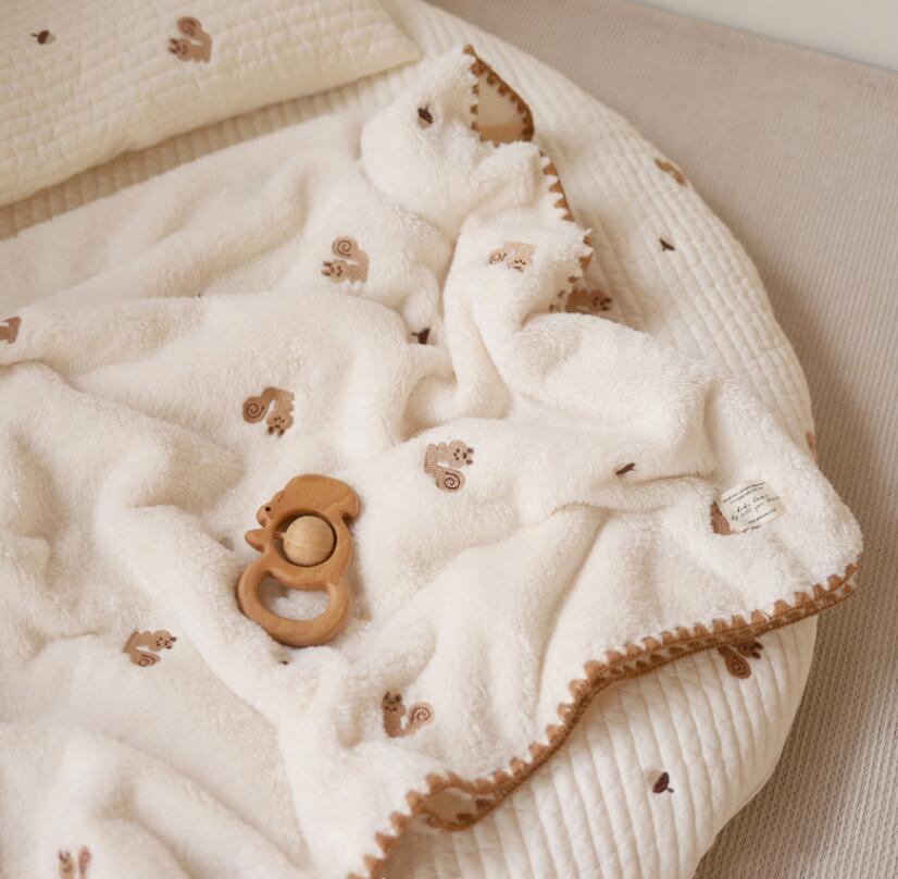 squirrel print swaddle